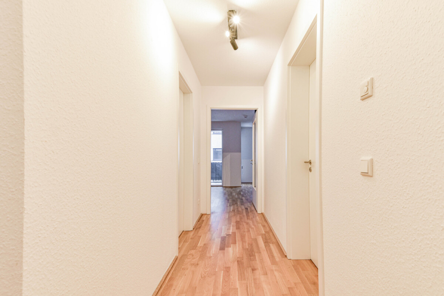 Flur - Wohnen im O-Quartier. 3-Zimmer-Wohnung mit ca. 81m² Wohnfläche und Balkon.