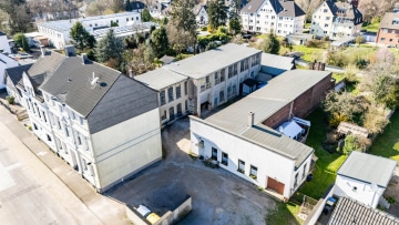 Wohn- und Gewerbeensemble vollvermietet – stabile Mieteinnahmen und vielseitige Nutzung, 42719 Solingen, Wohn- und Geschäftshaus