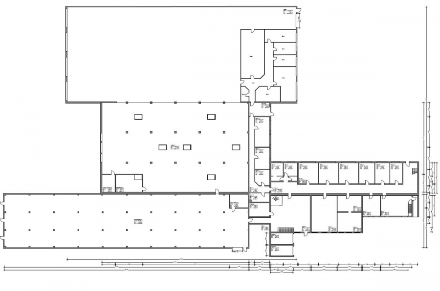 Erdgeschoss - Attraktive Gewerbeeinheit mit großzügiger Lagerfläche, Hochregallager und integrierten Büroflächen.
