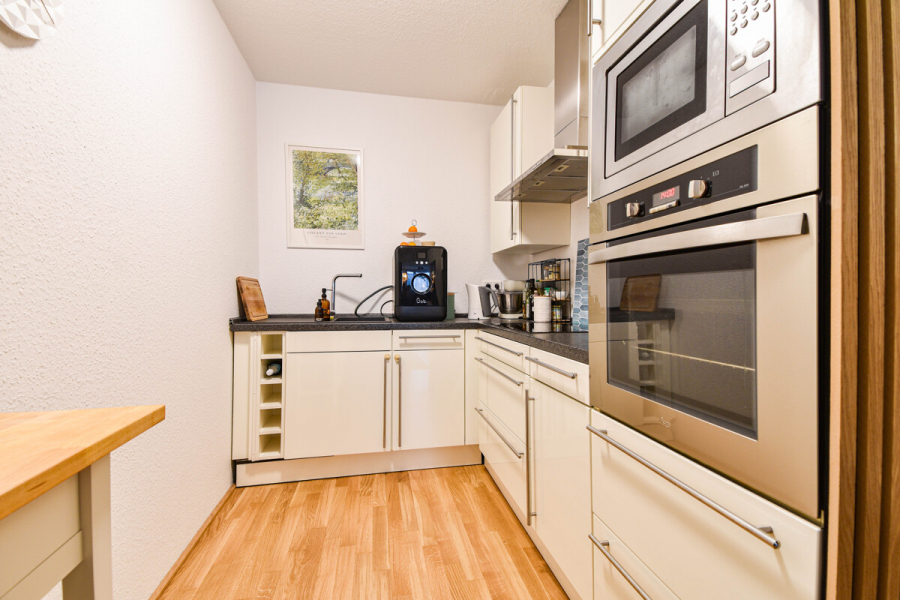 Küche - Moderne 2-Zimmer-Wohnung mit Balkon im O-Quartier in Solingen-Ohligs.