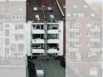 Rendite. Vollvermietetes Mehrfamilienhaus mit Garagen in sehr guter Lage von Düsseldorf-Bilk. - Ansicht von Hinten