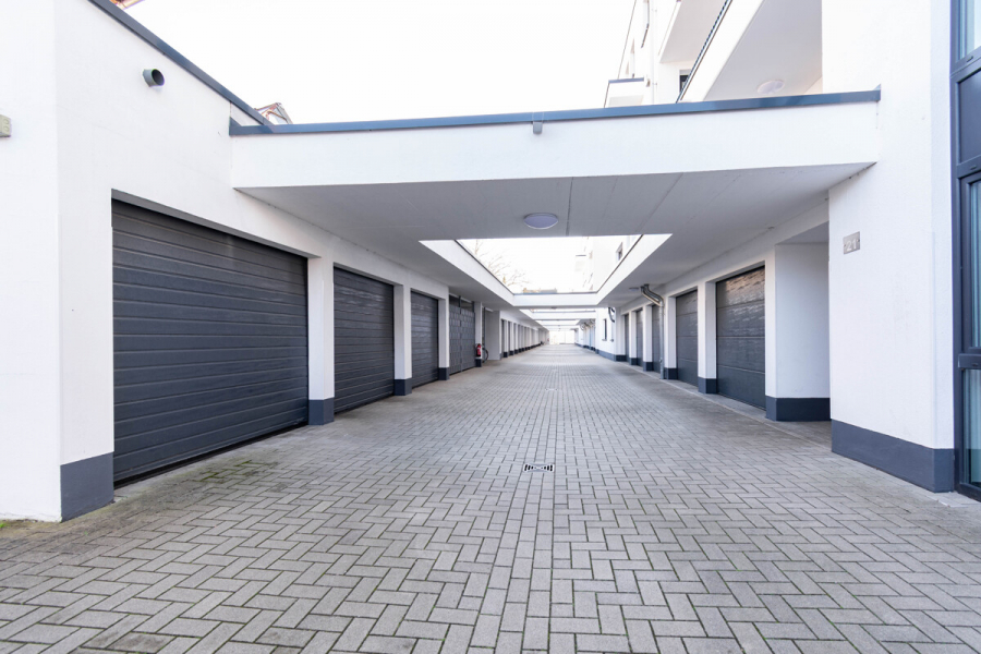 Zufahrt Garagen - Penthouse mit Dachterrasse, Aufzug direkt in die Etage und hochwertiger Ausstattung