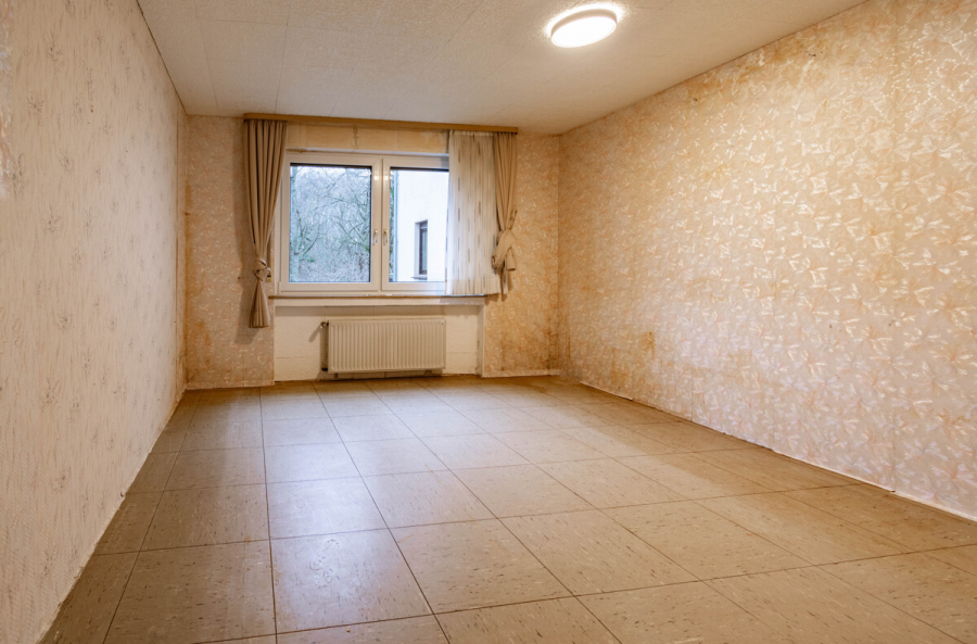 EG Kind - Aufderhöhe. 125m² Fläche. Charmante Wohnung mit vielseitigem Untergeschoss, Balkon und Garage.